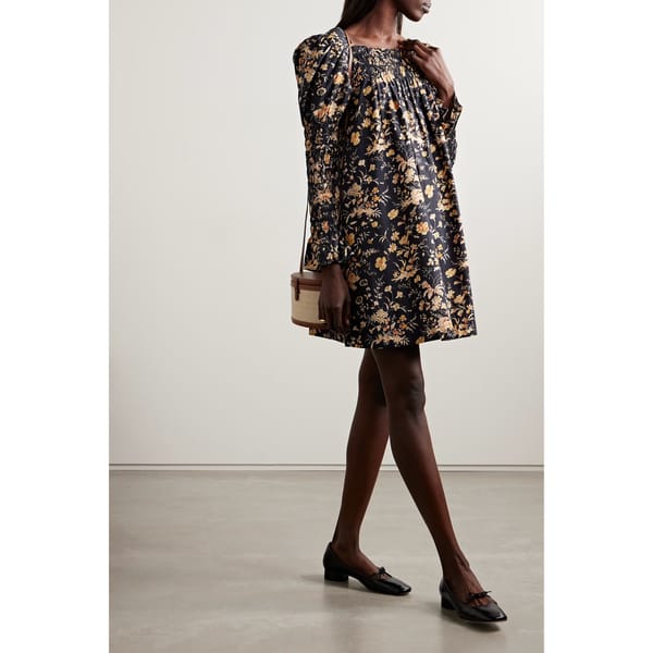 model wears Sabia shirred floral-print organic cotton-poplin mini dress