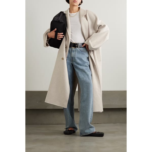 model wears off-white wool coat