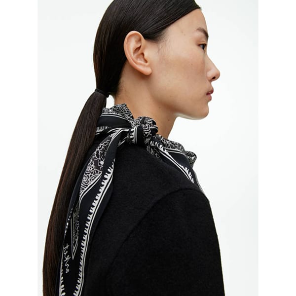 model wears black and white print Triangle Silk Scarf