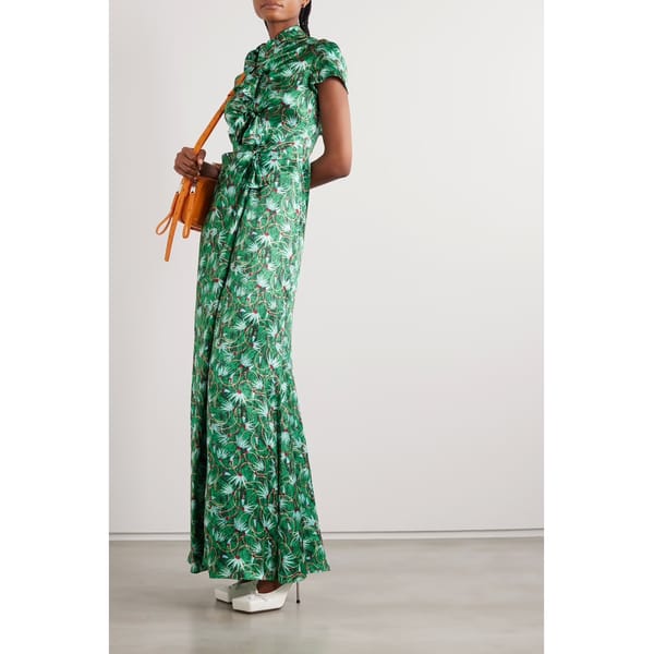 model wears green Kelly bow-embellished printed silk-satin maxi dress