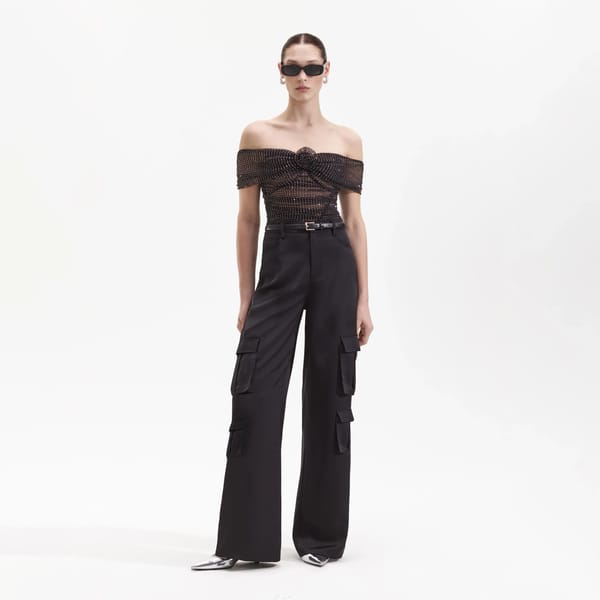 MODEL WEARS SELF-PORTRAIT BLACK RHINESTONE BARDOT TOP