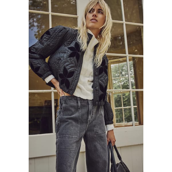 model wears black quilted Quinn jacket