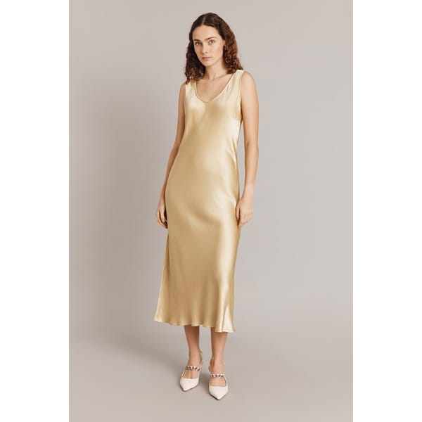 model wearing yellow silk dress