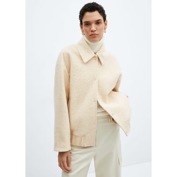 MODEL WEARS Oversized bomber jacket in light yellow