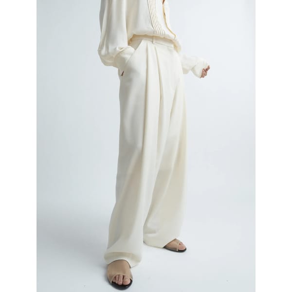 white pleat front trousers
