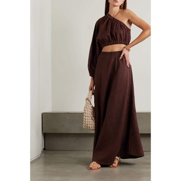 model wears brown linen set