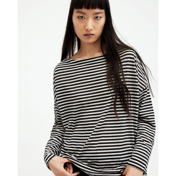 model wears striped long sleeve top