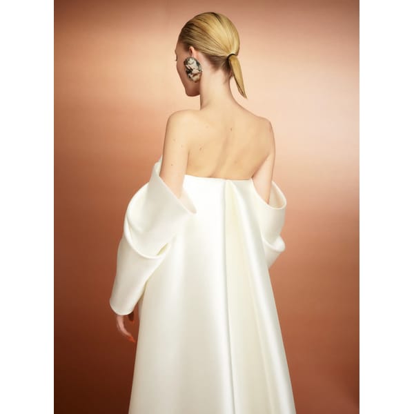 model from back wearing The Kyla Maxi Dress in Cream