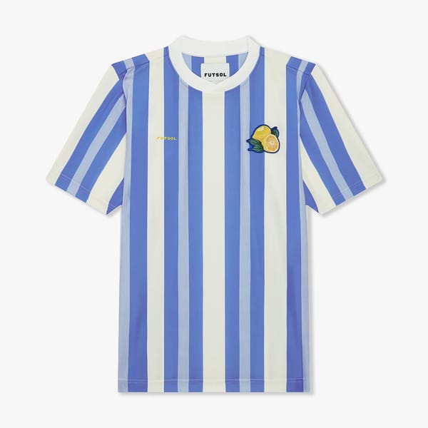 blue and white stripe football shirt with lemon motif