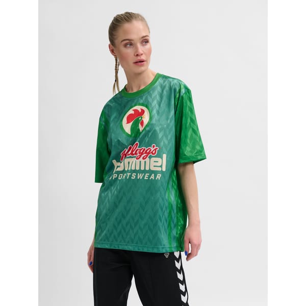 model wears green Kellogg's football shirt