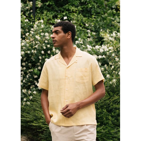 model wearing SIRPLUS Cornfield Yellow Linen Cuban Shirt