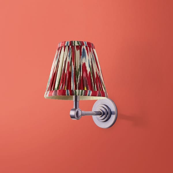 mini wall light with red and white print shade