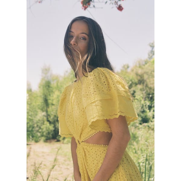 model wearing Maia Bergman yellow dress