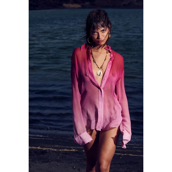 model wearing pink ombre blouse