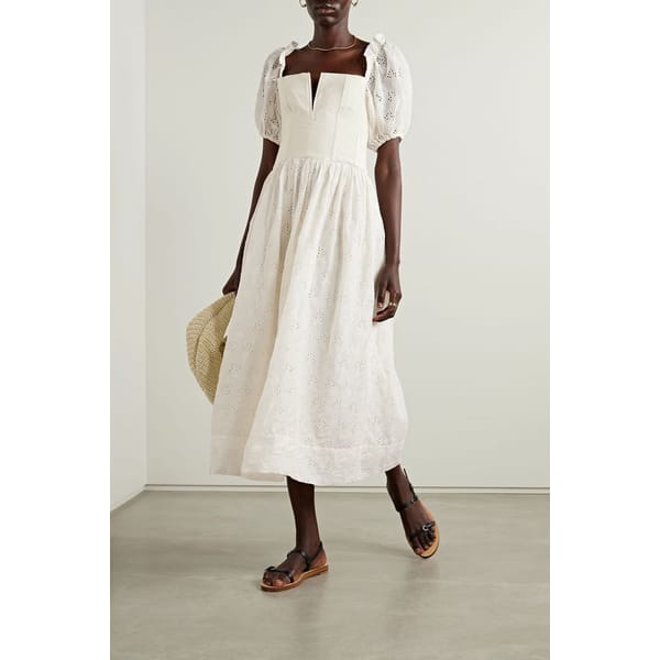 model wearing white midi dress