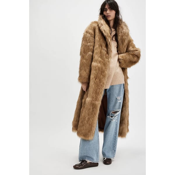 model wears brown FREEPEOPLE Annice Faux Fur Coat