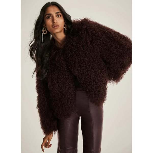 model wearing MINT VELVET Burgundy Mongolian Jacket
