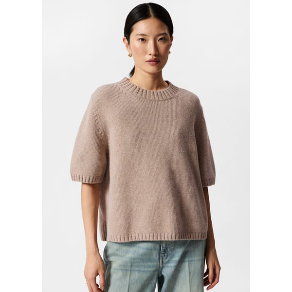 model wears Cashmere-Blend Knit T-Shirt in beige
