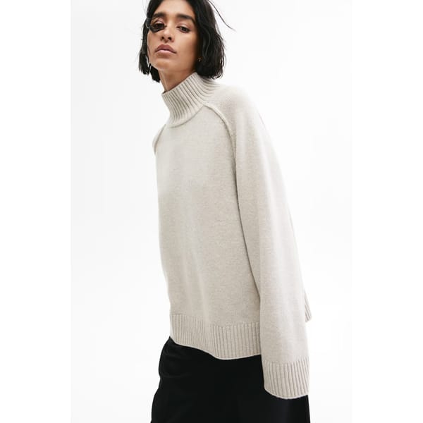 model wears cream Cashmere-blend turtleneck jumper