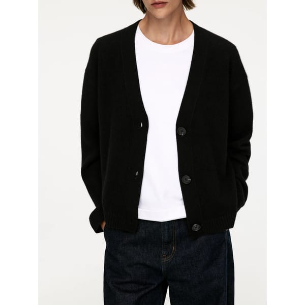 model wears black Cashmere-Wool Cardigan and white tee