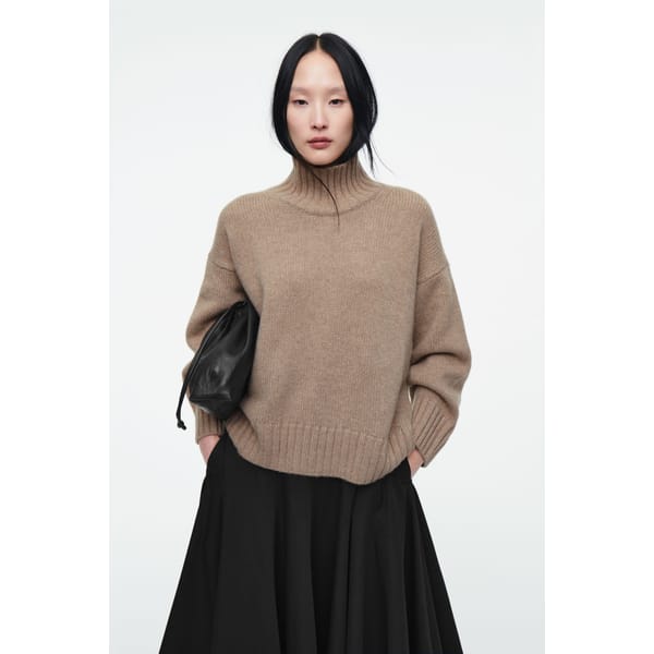 model wearing CHUNKY PURE CASHMERE TURTLENECK JUMPER