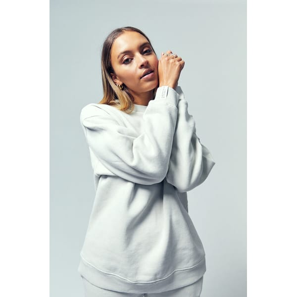 model wearing grey sweatshirt