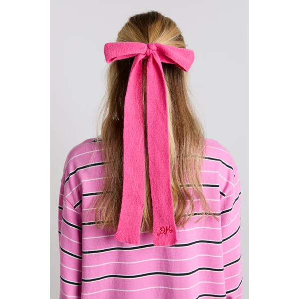 pink knitted bow in hair