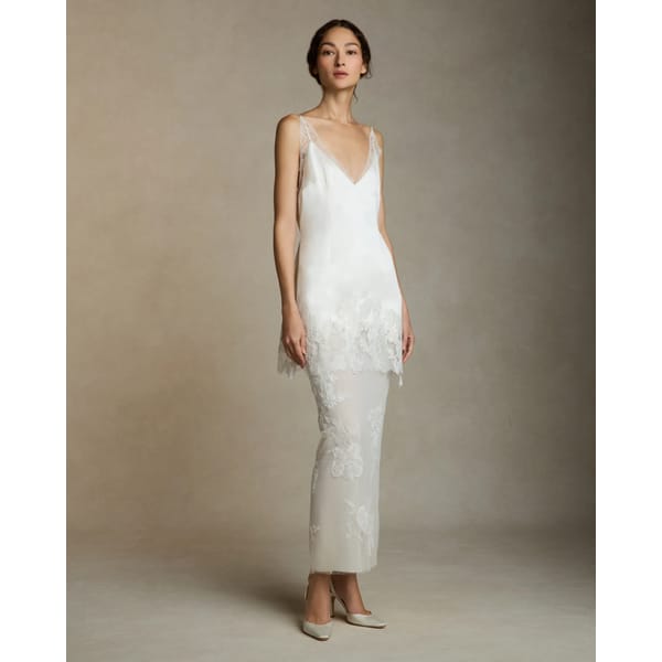 model in white lace wedding dress