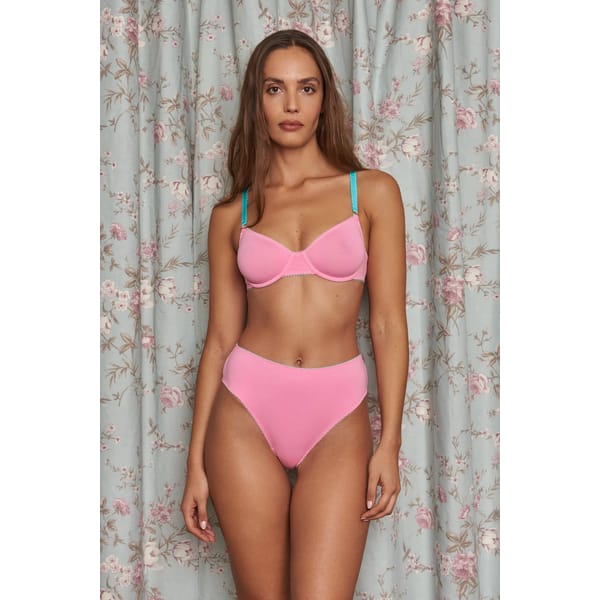 model wearing pink lingerie