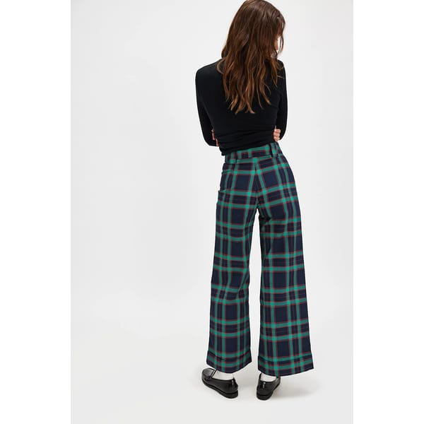 model from back wearing FREE PEOPLE MUTMA Suto Pants in navy and green tartan