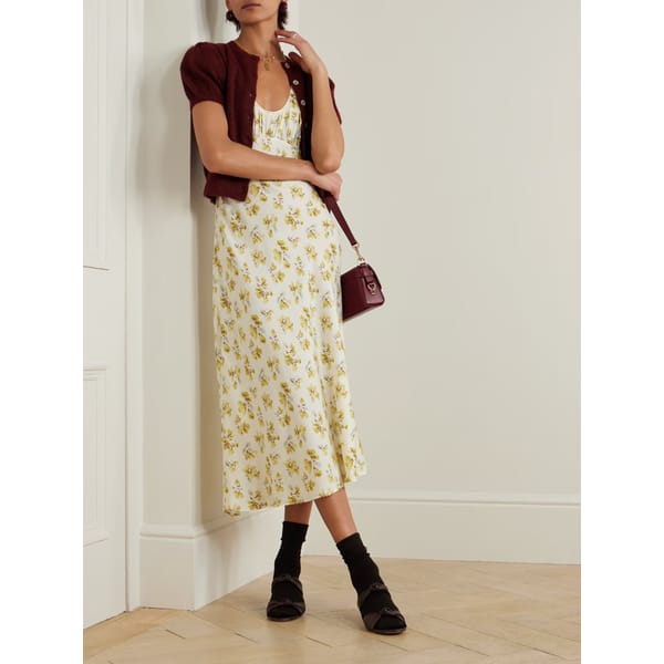model wearing floral print silk dress