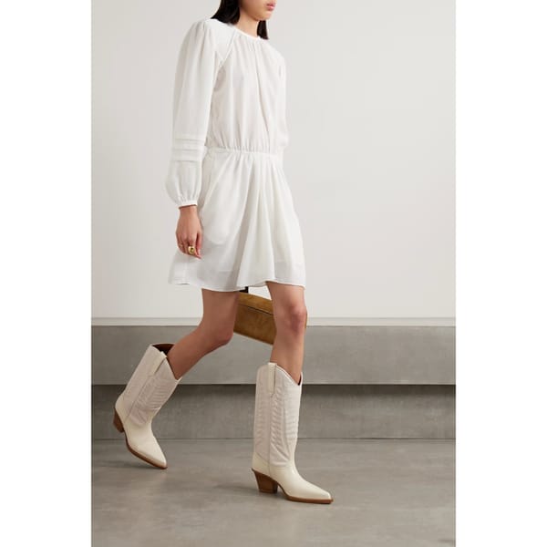 model wearing white marant etoile dress
