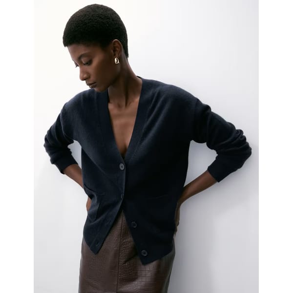 model wearing black Pure Cashmere V-Neck Button Front Cardigan
