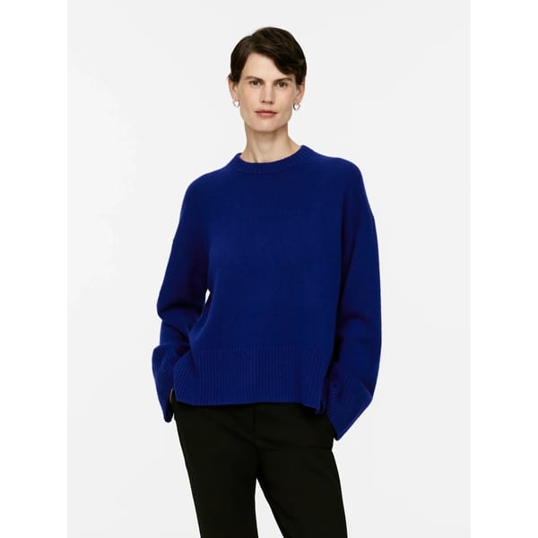 model wears blue Relaxed Cashmere-Wool Jumper BLUE