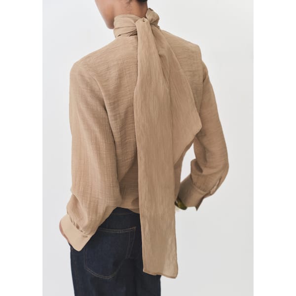 BOW TEXTURED BLOUSE FROM BACK