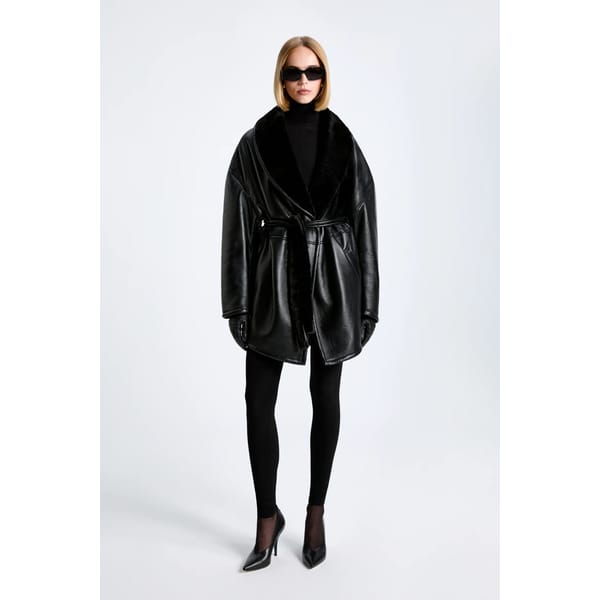 model wearing NOUR HAMMOUR Penelope Belted Shearling Coat