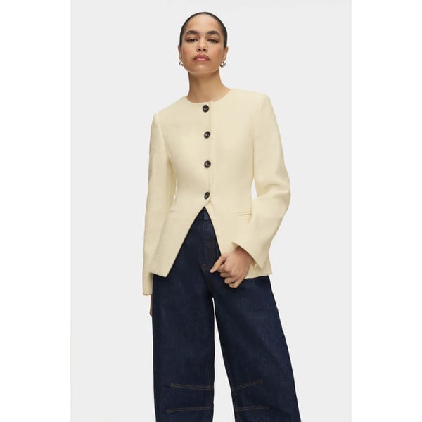 model wearing ALIGNE Daphne Waisted Boucle Blazer