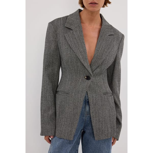 close up of model wearing dissh MERRITT CHARCOAL CINCHED BLAZER