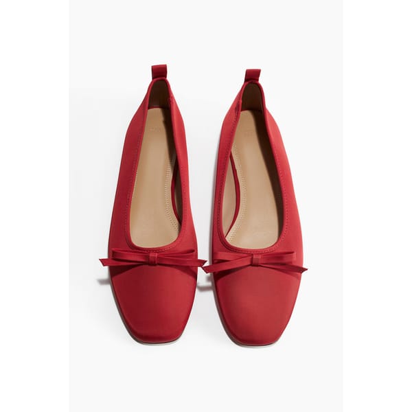 red ballet pumps with bow