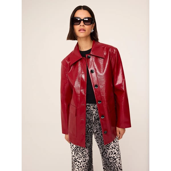 model wears KITRI Beatrix Red Vinyl Jacket