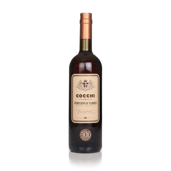 A bottle of Cocchi Storico Vermouth di Torino with a copper-coloured cap and a beige label, standing upright against a white background—perfect for drinks or as part of your favourite pairing guide.