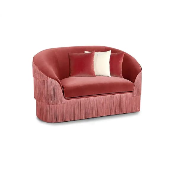 A red settee with fringes, this Granny Sofa adds a charming touch of vintage furniture style to any room.