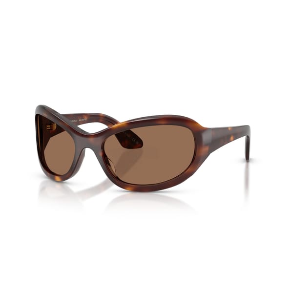 A pair of brown, oval-shaped sunglasses with a glossy tortoiseshell frame and brown-tinted lenses, displayed on a reflective surface.