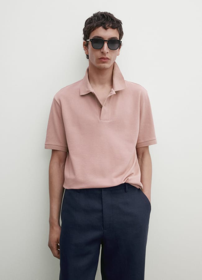 male model wearing pink MICROTEXTURED COTTON PIQUÉ POLO SHIRT pink