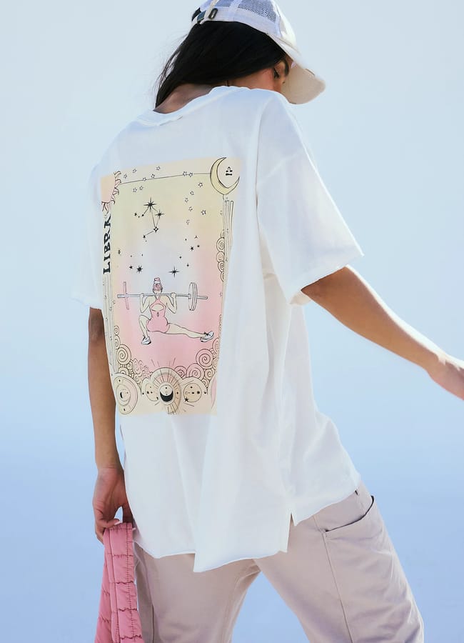 model wearing back printed zodiac design t-shirt