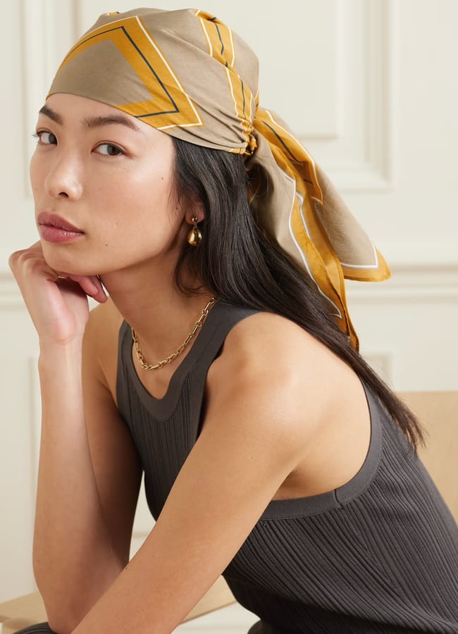 model wearing TOTEME Printed cotton and silk-blend scarf