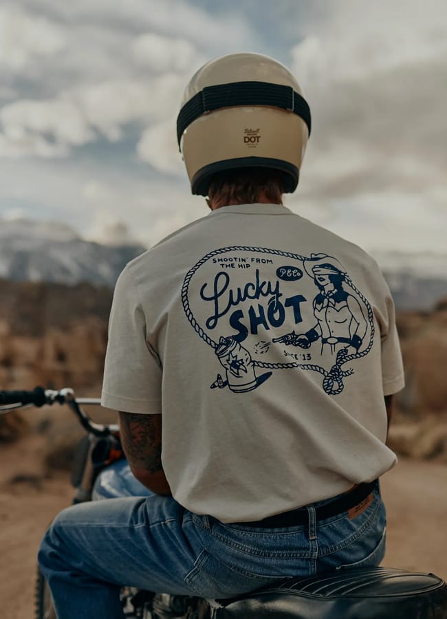 male model on motorbike wearing P & Co Lucky Shot T-Shirt - Bone