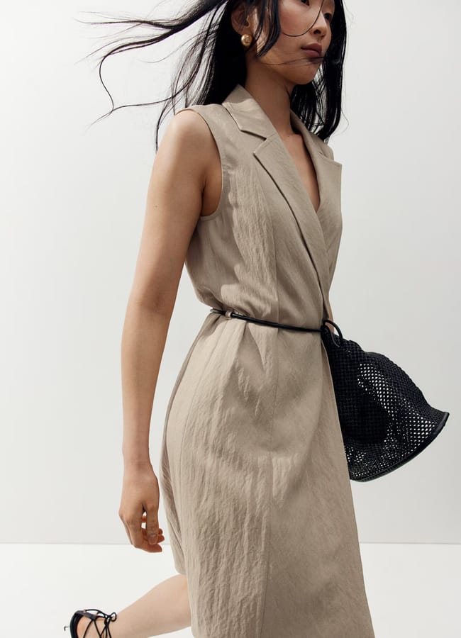 model walking wearing H&M Tie-belt blazer dress