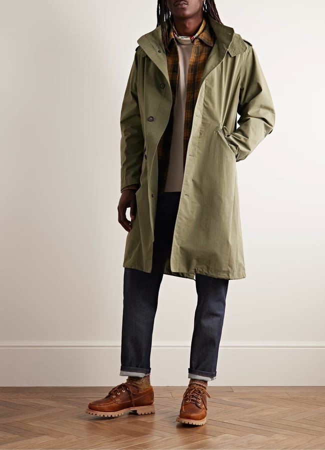 male model wearing parka and blue A.P.C. Martin Tapered Jeans £200