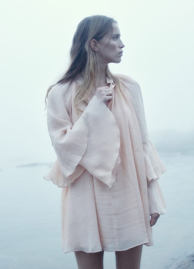 woman by water wearing pink Flounced A-line dress